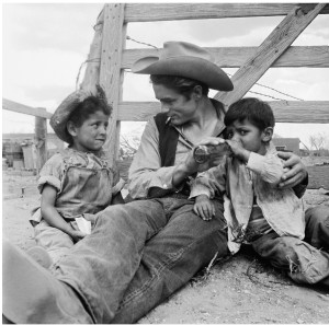 James Dean with two local children on location in Marfa, TX for George Steven's film, Giant.  Summer of 1956. Titles: Children of Giant  Photo by Richard C. Miller - © Richard C. Miller 